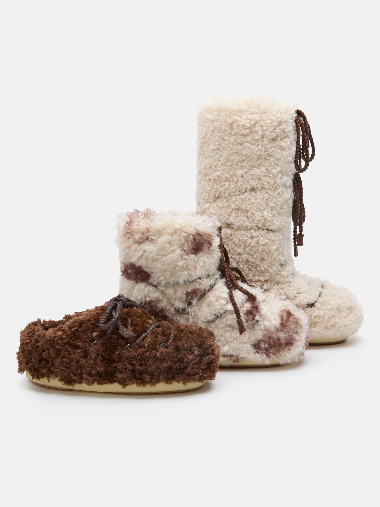 MOON BOOT EVX COW PRINT CURLY MULES